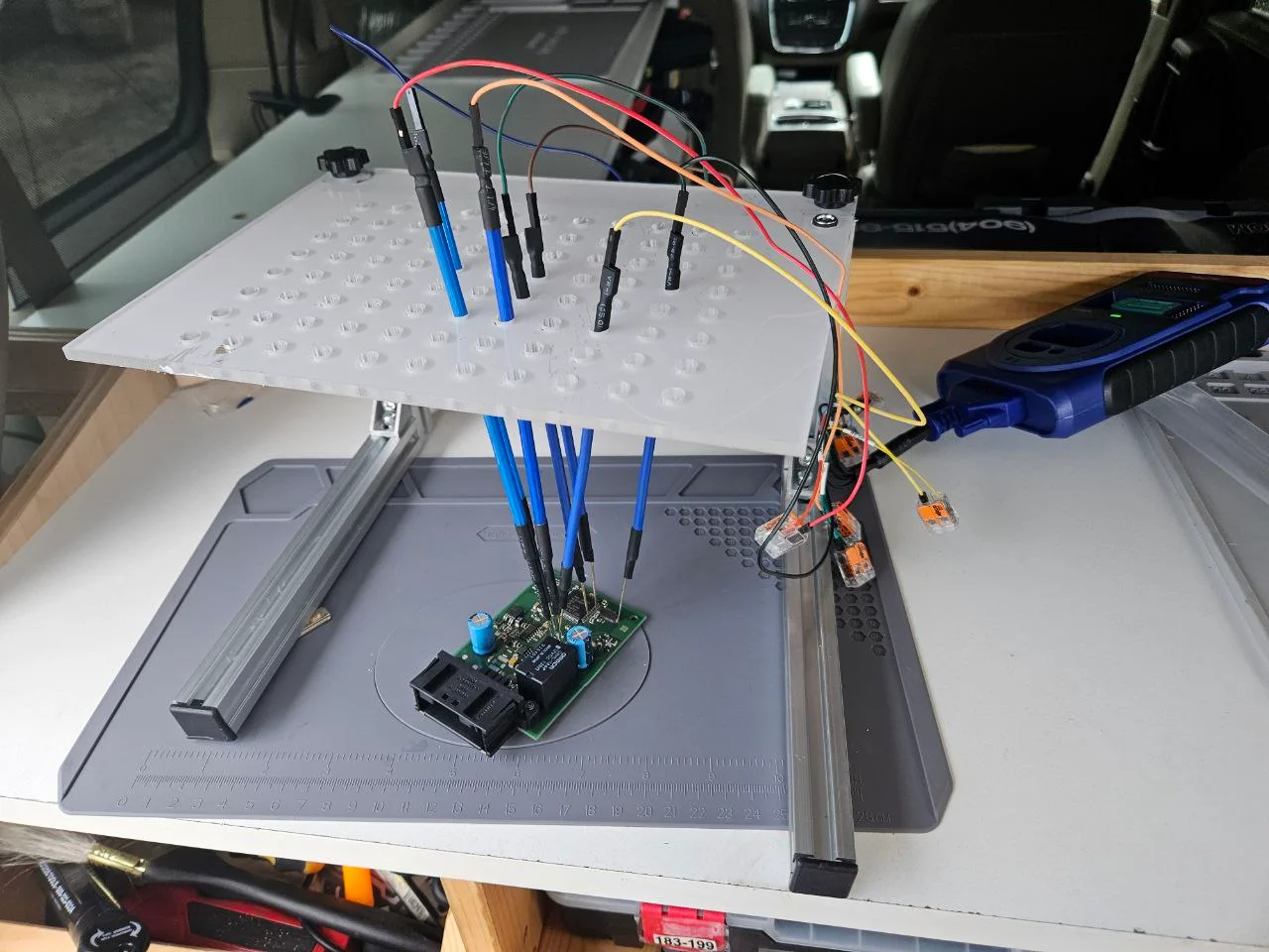 BMW electronic module and programming equipment on the Koala Locksmith mobile workbench